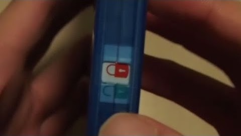 Simple tutorial:  Unlock a "Red and Green" slide lock on DVD/Blurray (without ruining the case)