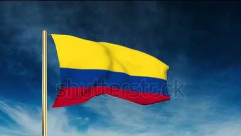 Colombia flag slider style. Waving in the win with cloud background animation Stock video by