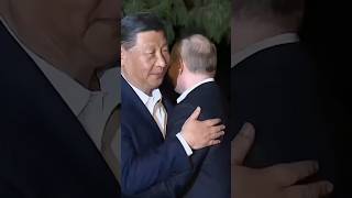 Putin and Xi Share Hug in Beijing