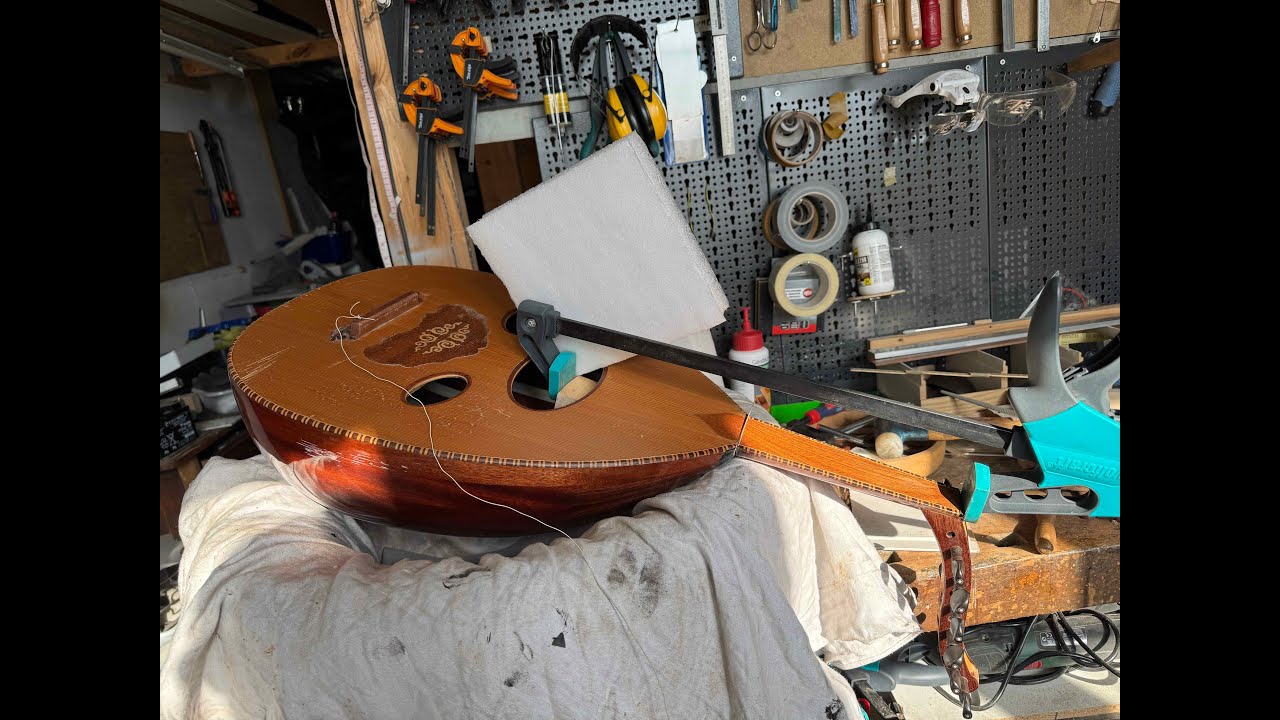 حل مشكلة ارتفاع الاوتار عن زند العود ج١