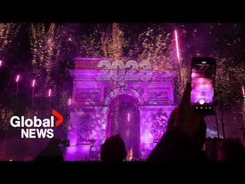 New Year's 2023: Paris, France gets the party started with fireworks smoke show over Arc de Triomphe