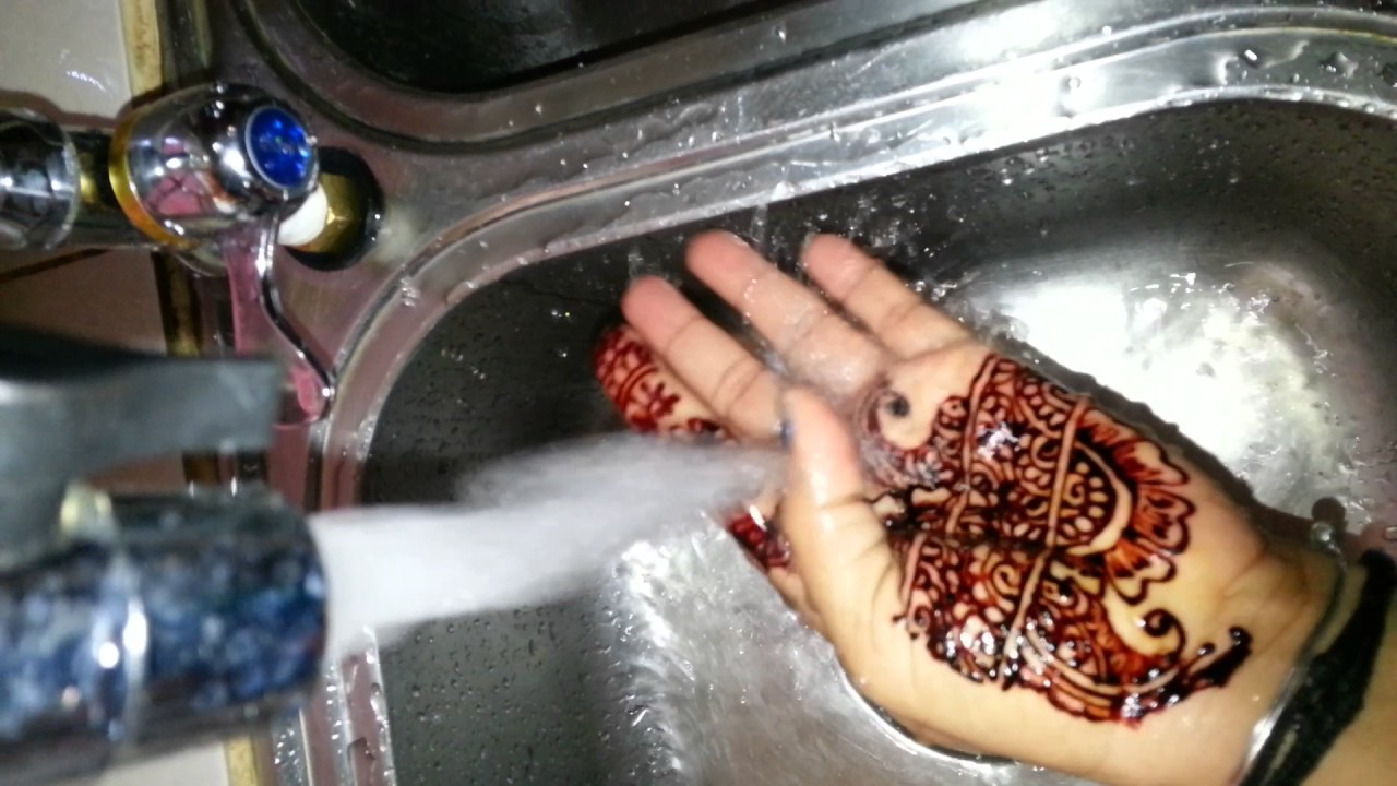 Video shows removing henna stain normally using water. YouTube