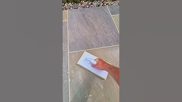 Grouting Porcelain tiles ⚒️#landscaping #patio #ideas #howto #garden #work #tipsandtricks #diy #fyp