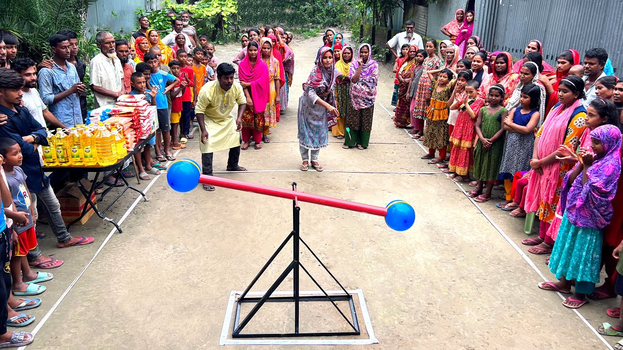 ঘুড়ন্ত বেলুন ডার্ট ছুঁড়ে ফাটানোর আজব চ্যালেঞ্জে কে হবে জয়ী আর জিতে নিবে পুরস্কার, চলুন দেখি !