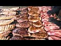 Huge Blocks of Angus Meat, Steaks, Ribs, Sausages. Argentina Street Food @ Biker Fest, Lignano