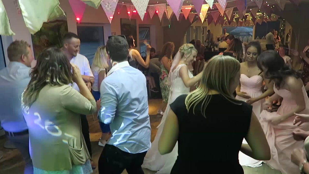 Just married, Mr and Mrs Moon at the Sandbar with SoundONE Disco / Cornwall Wedding DJ