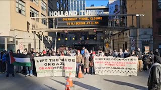 More than 100 protesters arrested for blocking traffic along major bridges, tunnels