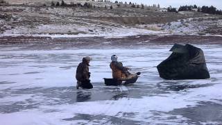 a sled, a tarp, and a rope.4