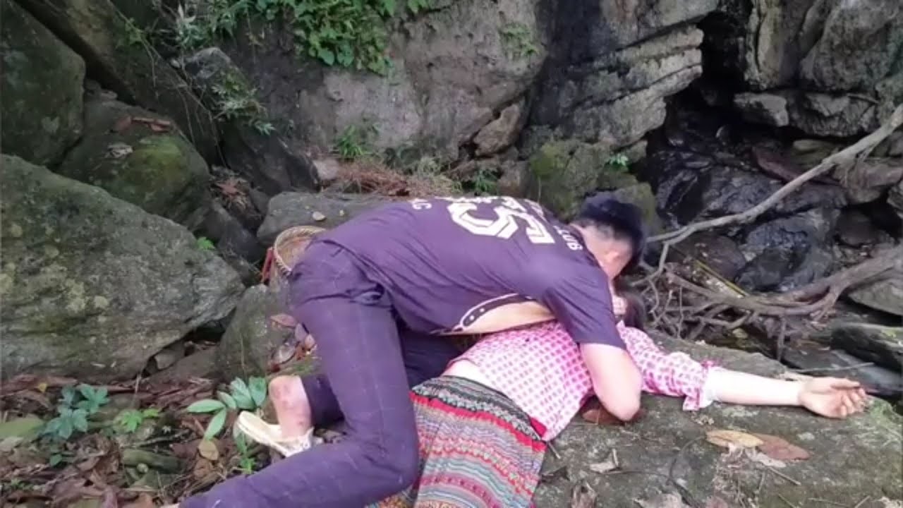 The girl went into the forest to look for food along the stream ...
