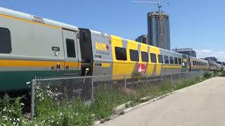 Via Rail 84 and old GP9 CN 7058 on Train 568 Kitchener Park Street