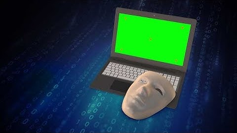 Hacker mask on laptop chroma screen for cyber security  | stock footage | stock video | Cinefootage
