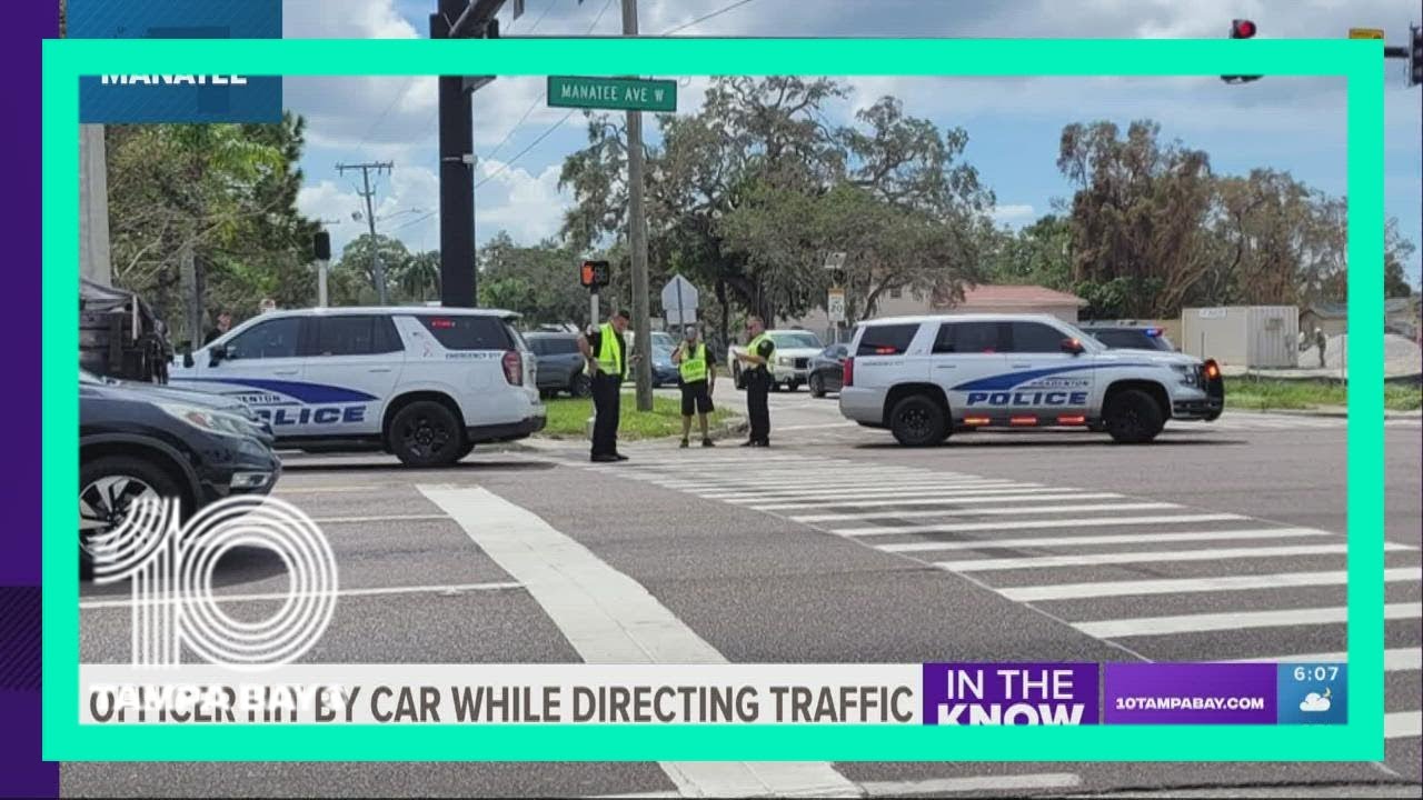 Bradenton police officer hit by driver while directing traffic - YouTube