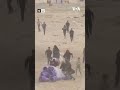 Palestinians run after aid trucks as more supplies arrive in Gaza | VOA Urdu