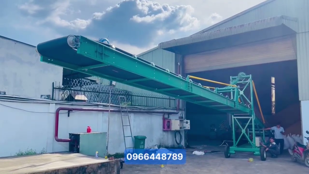 Băng tải Cao Su lòng máng 16M , băng tải lên xe Container 