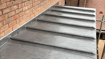 Installation Of 7 Bay Code 5 Lead Flat Roof