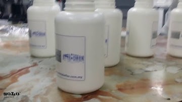 Vertical Wrap Around Labelling Machine | Bottle Labelling Machine | Solo Labeller Technology