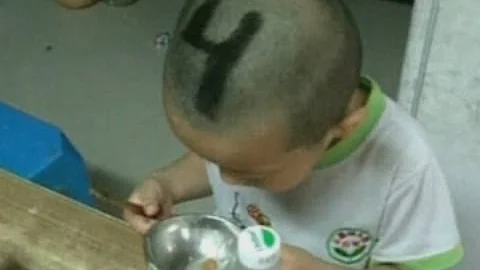 Mother in China keeps track of identical quadruplets by shaving numbers in their hair - DayDayNews