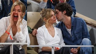 Celebrity Sienna Miller packs on the PDA with her boyfriend Oli Green as she puts on a very animated display Wealth