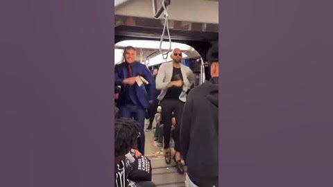 Andrew Tate dancing on train