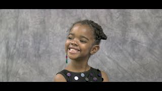 Akron art teacher launches free picture day for inner city students