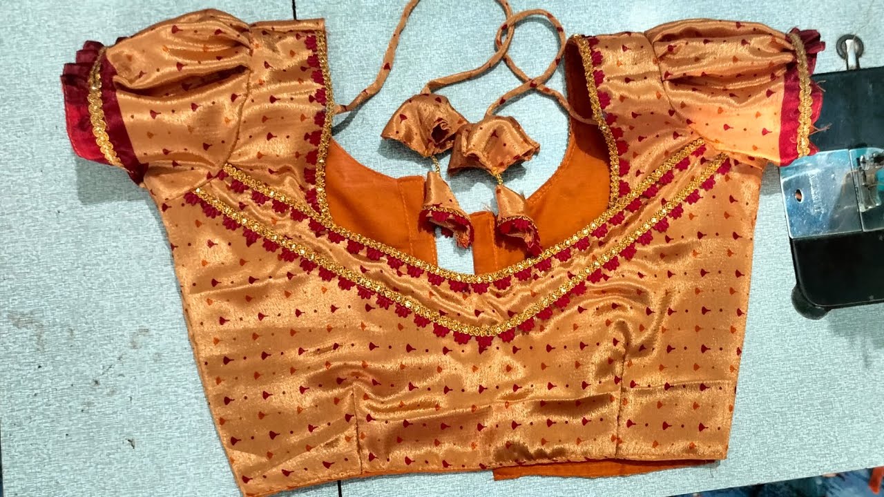 Very simple back neck design sleeve design....