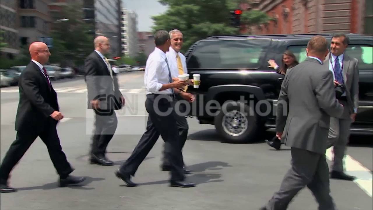 OBAMA WALKING W STARBUCKS- 'IT'S TEA'