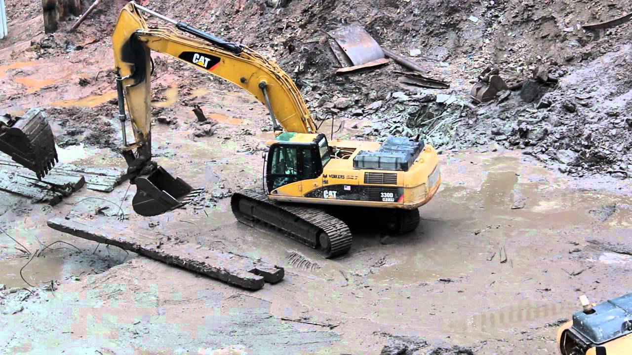 Cat 330DL excavator moving mud mats YouTube