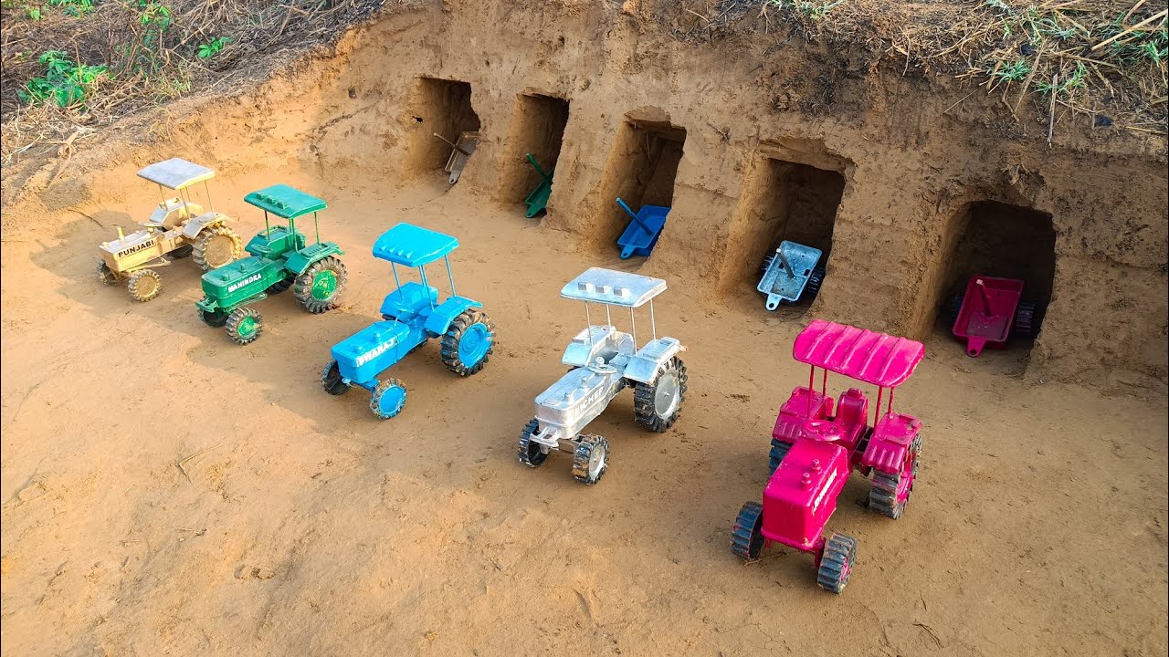 The tractor stopped in the middle but the trolley got hidden in the pit