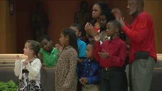 People gather to pray for young victims of violence