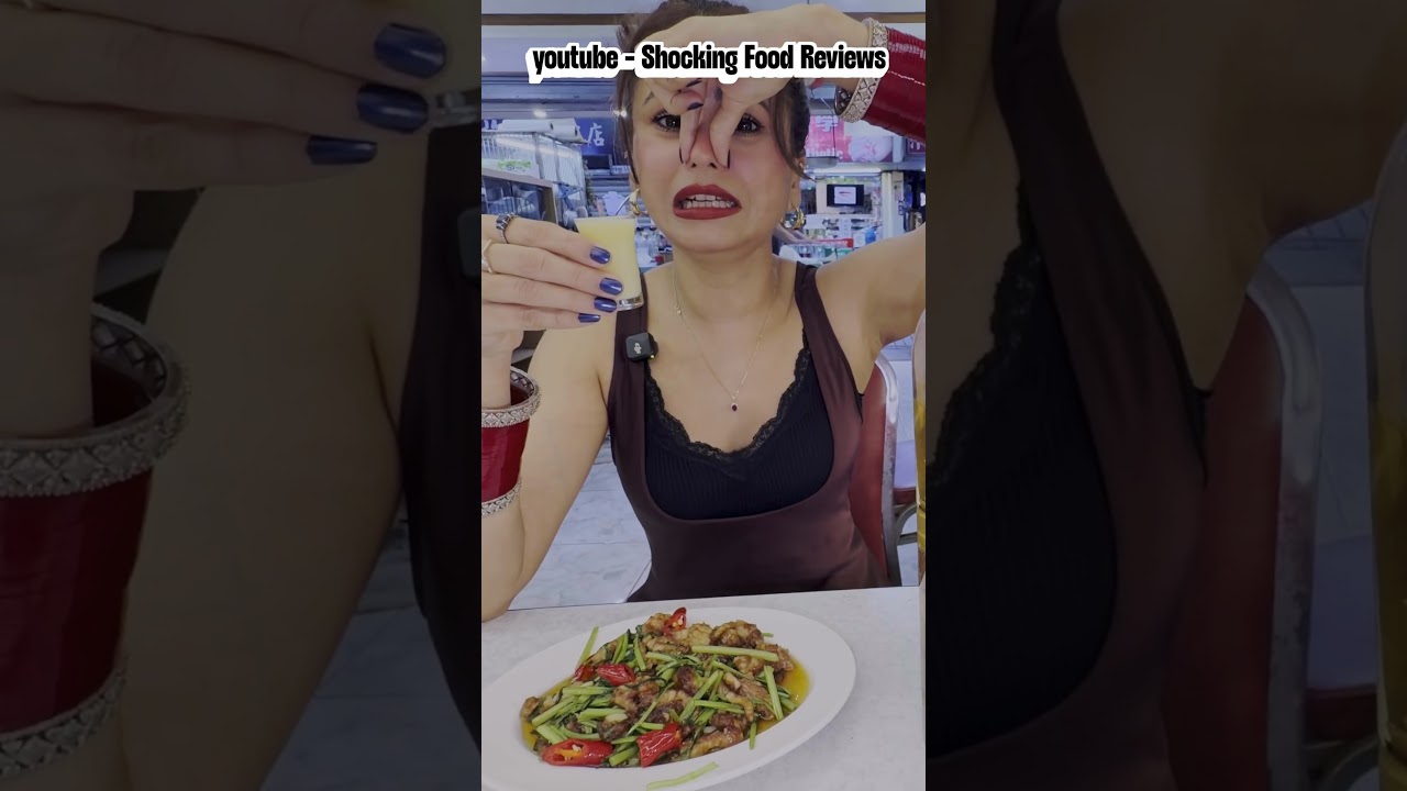 Indian Girl eat snake in taiwan. Instant Regret!