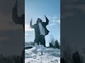 Hooded Man's Energetic Dance in Snowy Outdoors#SnowDance #WinterFun #EnergeticMoves