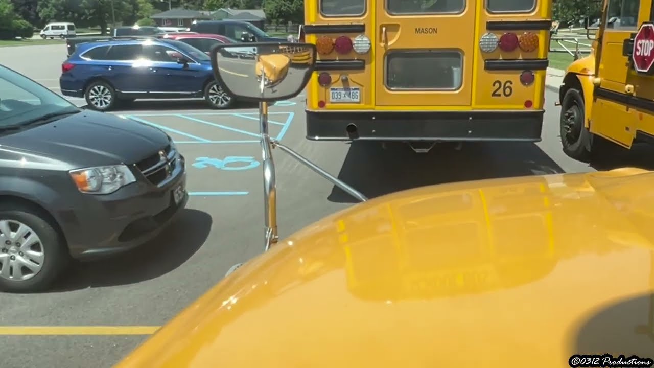 A Convoy Through Town in A 2021 IC CE Gasoline School Bus W/ PSI 8.8L