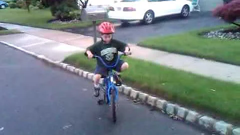 Matthew Rides His Bike