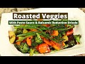 Roasted Vegetables Over Pesto Sauce With A Balsamic Reduction Drizzle