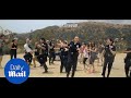 Tinseltown throwdown: LAPD take on Running Man Challenge - Daily Mail