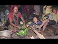 Mother cooks green organic vegetables in traditional way ll Primitive technology