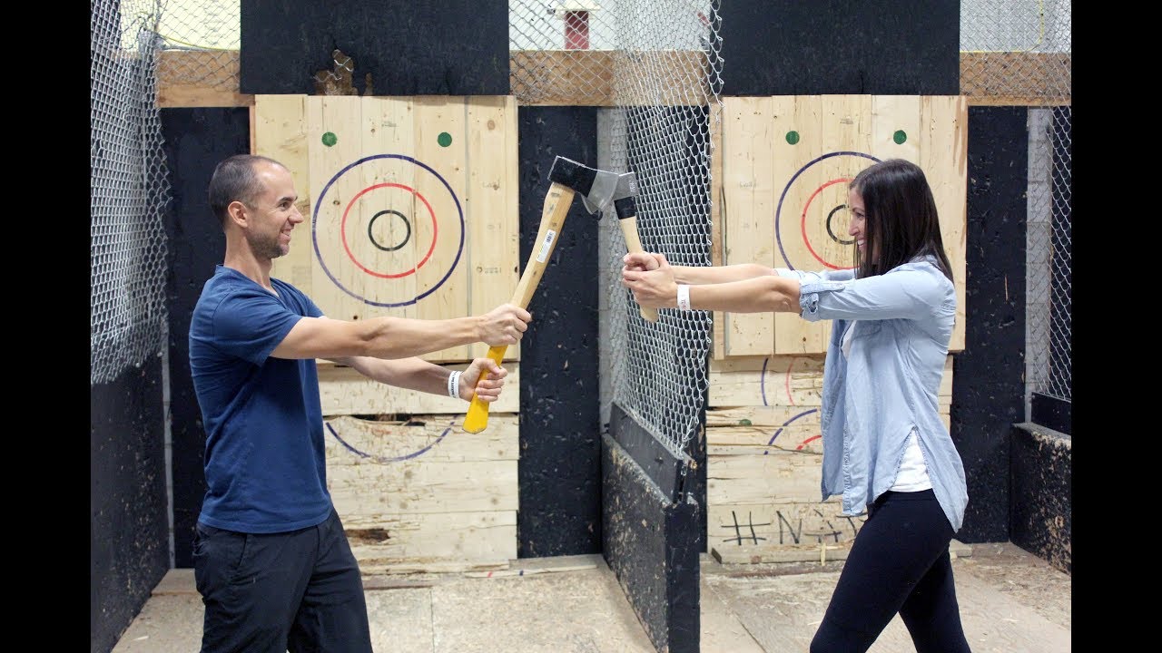 Is she ever going to hit that target? BATL Axe Throwing Calgary