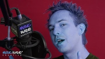 Electronic Voice Over Beat Matched To A Music Bed