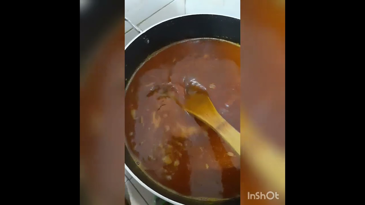 local palm oil rice with locust bean/smoked fish