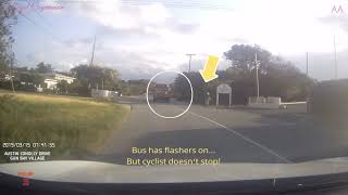 Cyclist Ignores Flashing School Bus