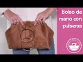 Bolso de mano con pulseras