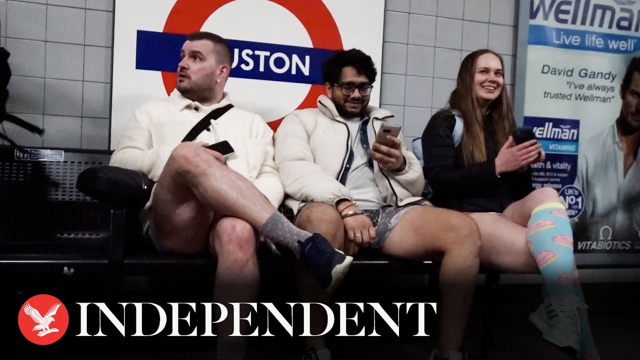 Londoners strip down to underwear for annual no-trousers tube ride