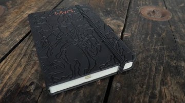 Debossed Notebook with orange foil and digitally printed packaging