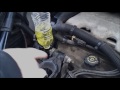 Removing air pockets in engine  with plastic bottle