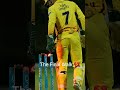 MS Dhoni playing his last match, massive crowd cheering with phone flashlights, emotional farewell