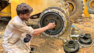 Caterpillar wheel loader 950E front wheel seal replacement & also change broken bearings