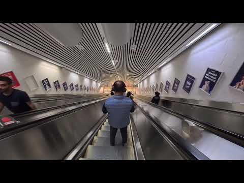A walk through Stockholm City train station and boarding a train.