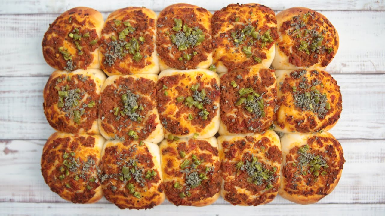 فطاير البيتزا بعجينة طرية وهشه وناجحة جدا تقدري تستخدمي العجينة لأي نوع من المعجنات