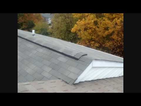 Video of an estimate for a new townhouse roof in Laurel, Maryland. Replace 25 year 3-tab shingle roof: 1. Remove existing shingles and tarpaper. 2. Replace water damaged plywood. 3. Install titanium UDL synthetic underlayment. 4. Install new Certainteed XT25 shingles 5. Install three new pipe collars 6. Install Shingle Vent II ridge vent system in place of leaky metal ridge vent. 7. Clean and tighten gutters. 8. Remove all debris from job site. 9. Remove nails from job site with special roofing magnet. 10. 10-year "no leak" labor warranty. 11. 25 year warranty on shingles by Certainteed Corp. (manufacturer) ******************************************** Here's the video of the actual installation of the new roof after the homeowner gave us the "go ahead" www.youtube.com