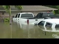 CNN tours Texas neighborhood buried by water